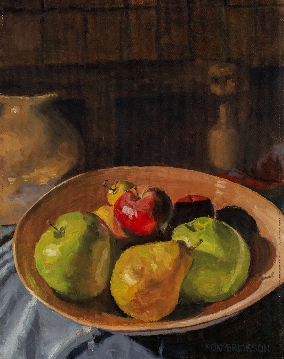 Still life painting of a bowl of apples and pears on a table