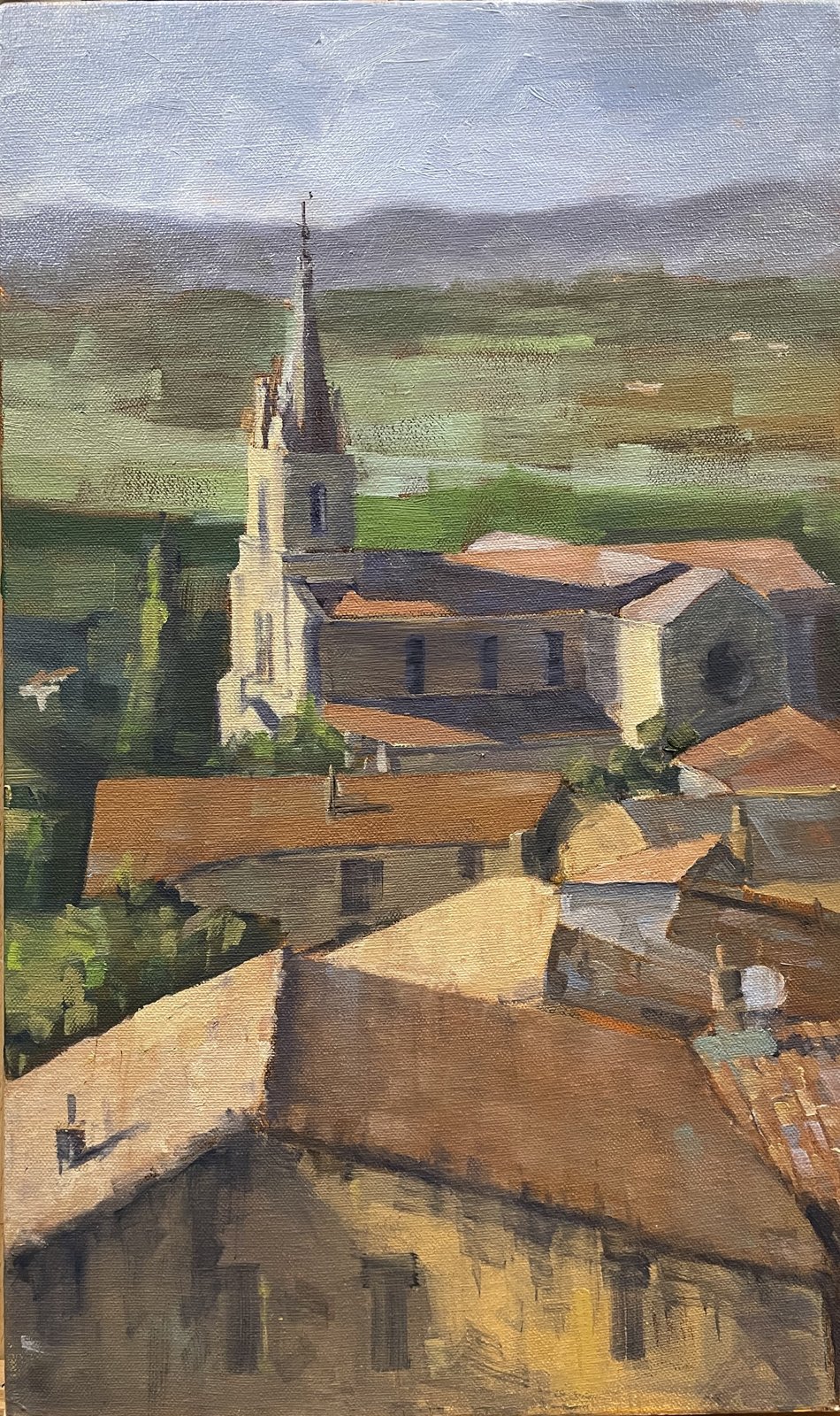 Painting of a French village with a church steeple