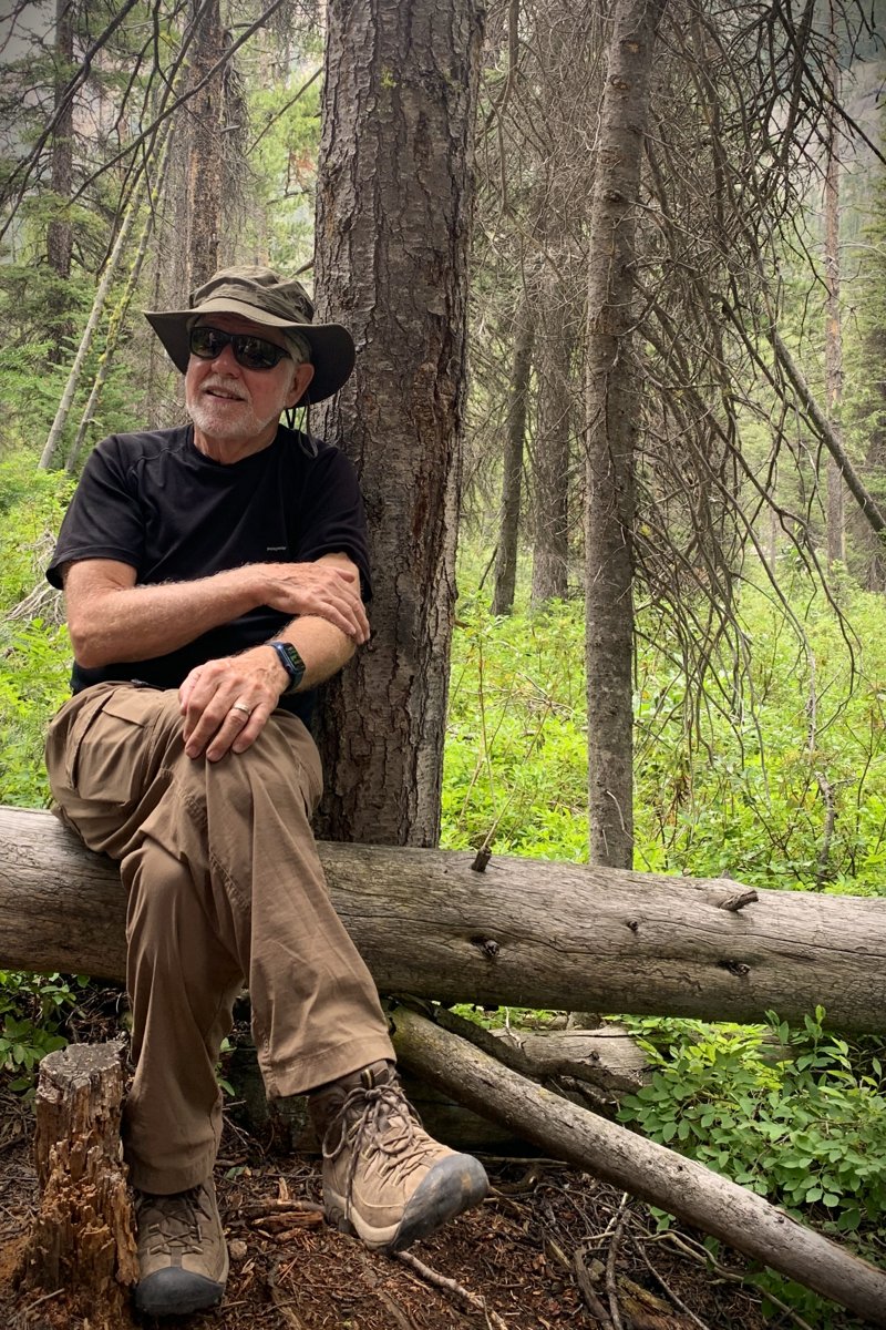 Ron Erickson standing in the woods